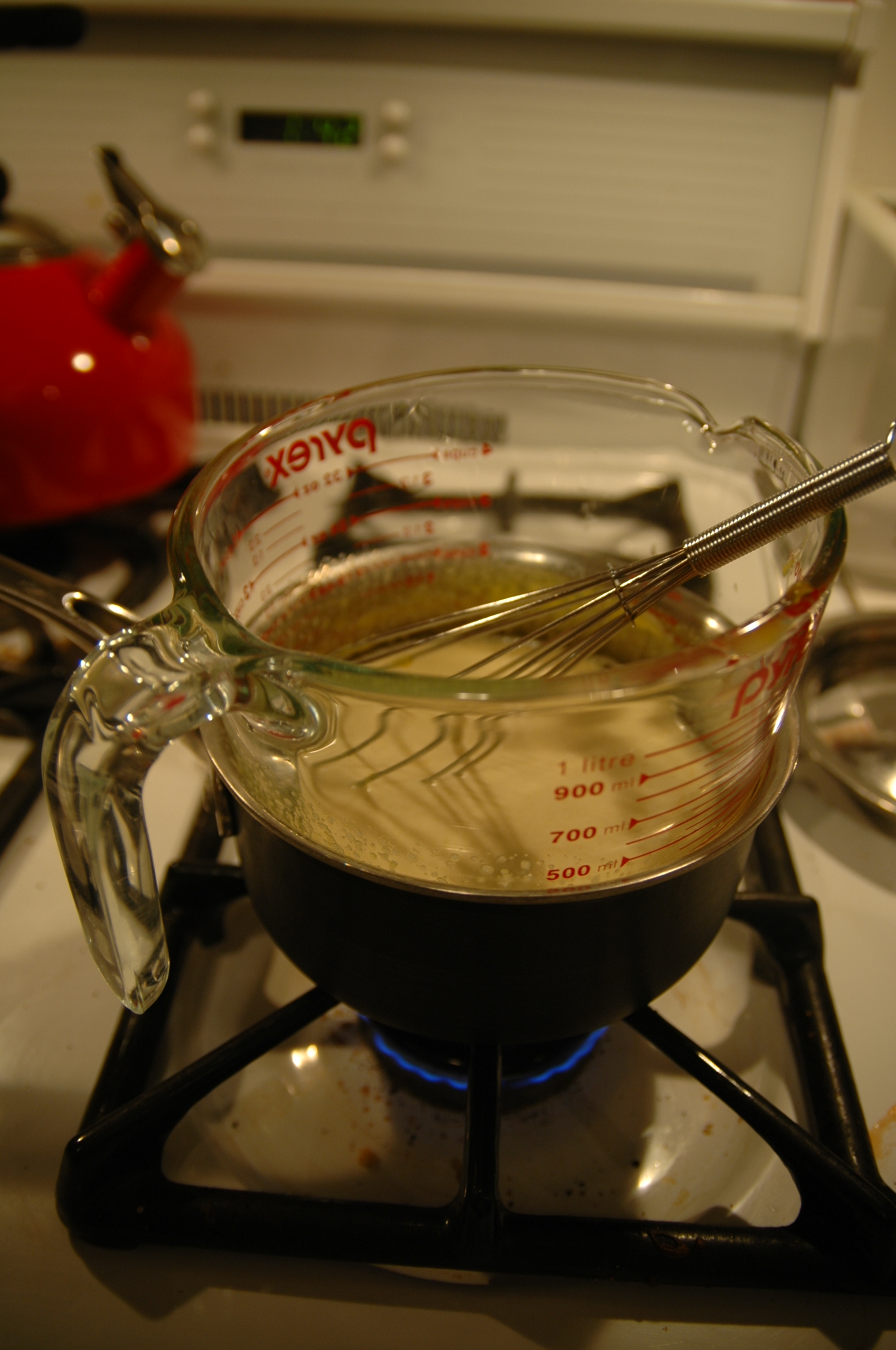 Double Boiler: Measuring Cup + Saucepan=Makeshift and workable